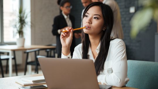 Entrepreneur in Naples, Florida reviewing a retirement income plan with a financial advisor.