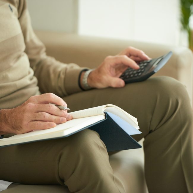 Advisor in Bonita Springs reviewing retirement tax planning strategies with clients.