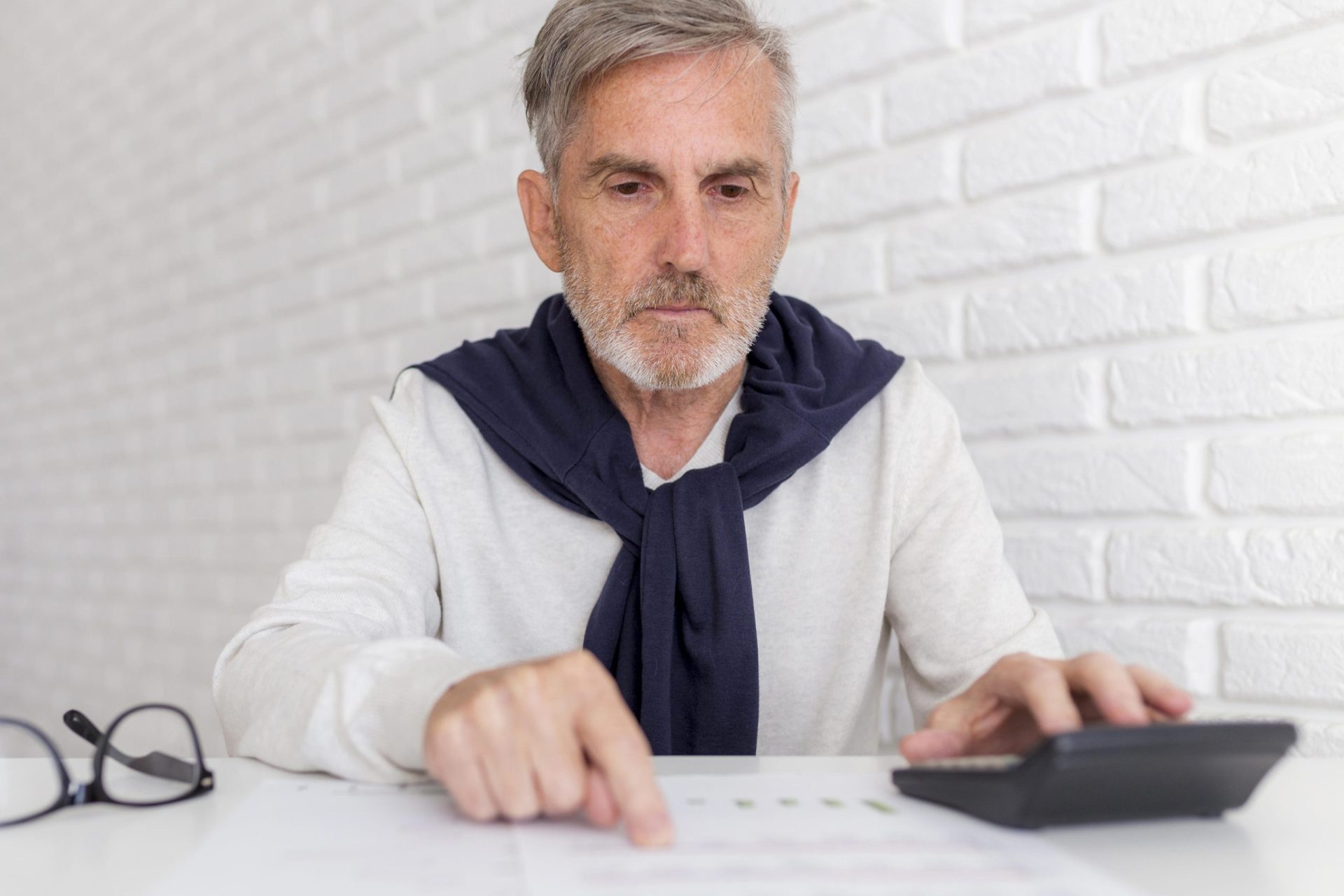 Advisor reviewing retirement investment planning stages with clients in Southwest Florida