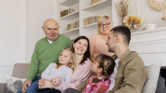 Family discussing legacy estate planning and future goals with a financial advisor in Southwest Florida