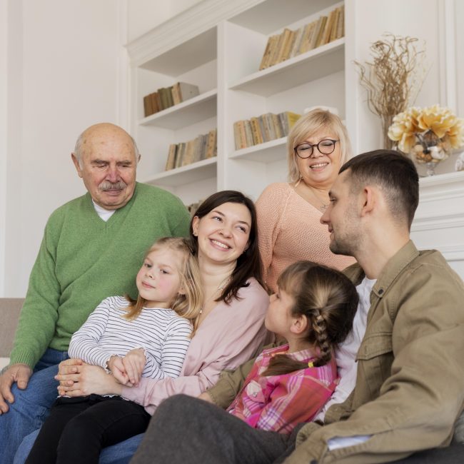 Family discussing legacy estate planning and future goals with a financial advisor in Southwest Florida