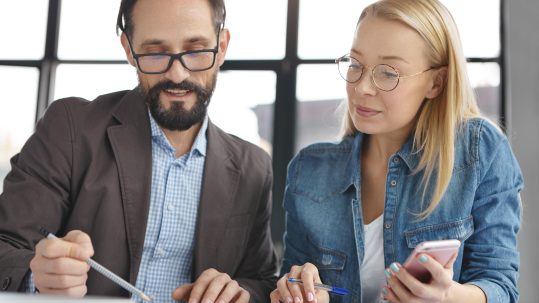 Federal retiree in Southwest Florida reviewing TSP and IRA options with a financial advisor
