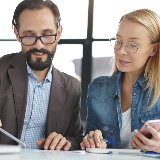 Federal retiree in Southwest Florida reviewing TSP and IRA options with a financial advisor