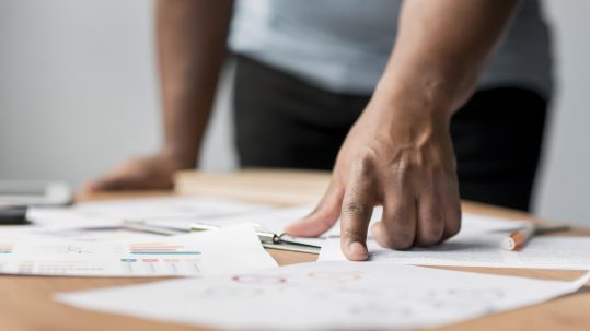 Financial advisor in Southwest Florida reviewing retirement tax planning strategies with clients