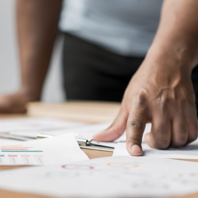 Financial advisor in Southwest Florida reviewing retirement tax planning strategies with clients