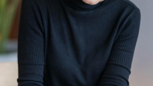 Financial advisor reviewing a financial plan with clients in Southwest Florida