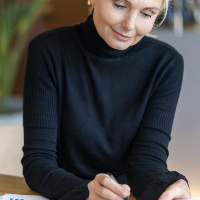 Financial advisor reviewing a financial plan with clients in Southwest Florida