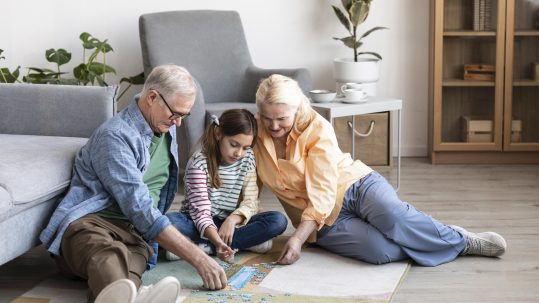 Family reviewing a personalized legacy estate plan with a financial advisor in Southwest Florida.