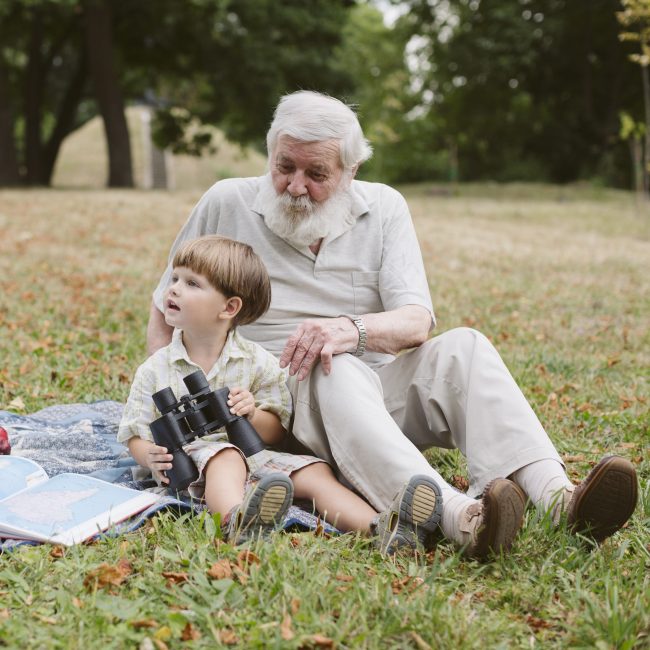 Pre-retirees reviewing health care retirement planning options with a financial advisor in Southwest Florida.