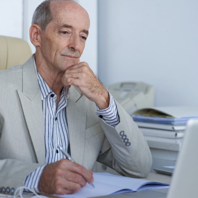 Federal employee reviewing retirement planning options with a financial advisor in Southwest Florida.