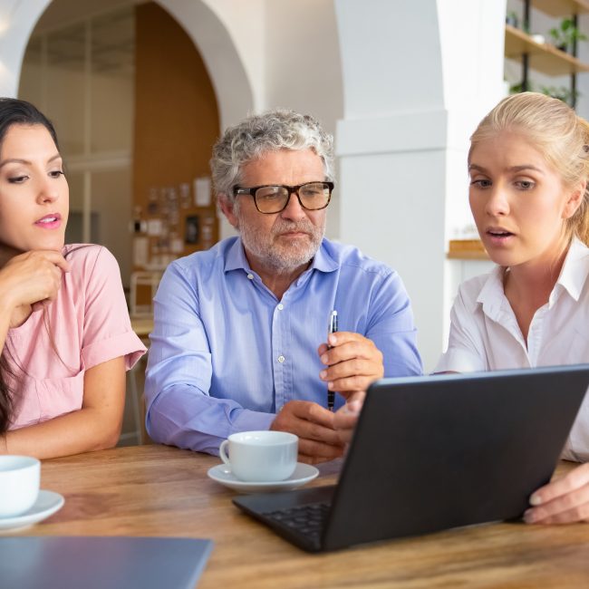 Beginner reviewing retirement tax planning basics with a financial advisor in Southwest Florida.