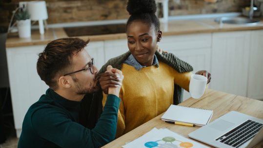 Clients having a thoughtful financial planning conversation with an advisor in Southwest Florida.