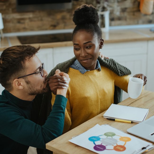 Clients having a thoughtful financial planning conversation with an advisor in Southwest Florida.