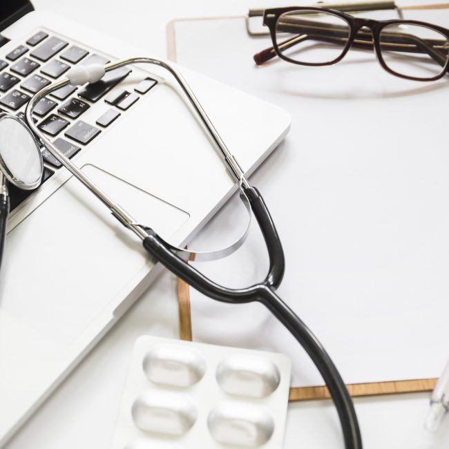 Retirees reviewing health care retirement planning options with a financial advisor in Southwest Florida.