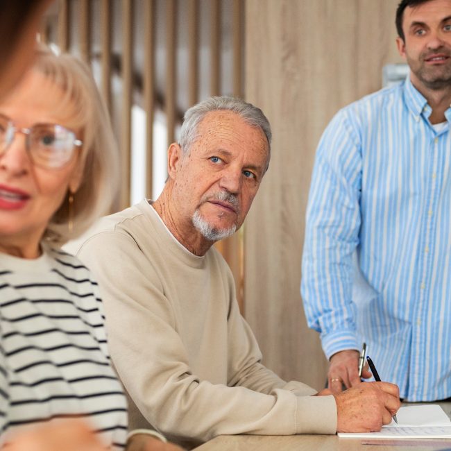 Family discussing retirement tax planning decisions with a financial advisor in Southwest Florida.