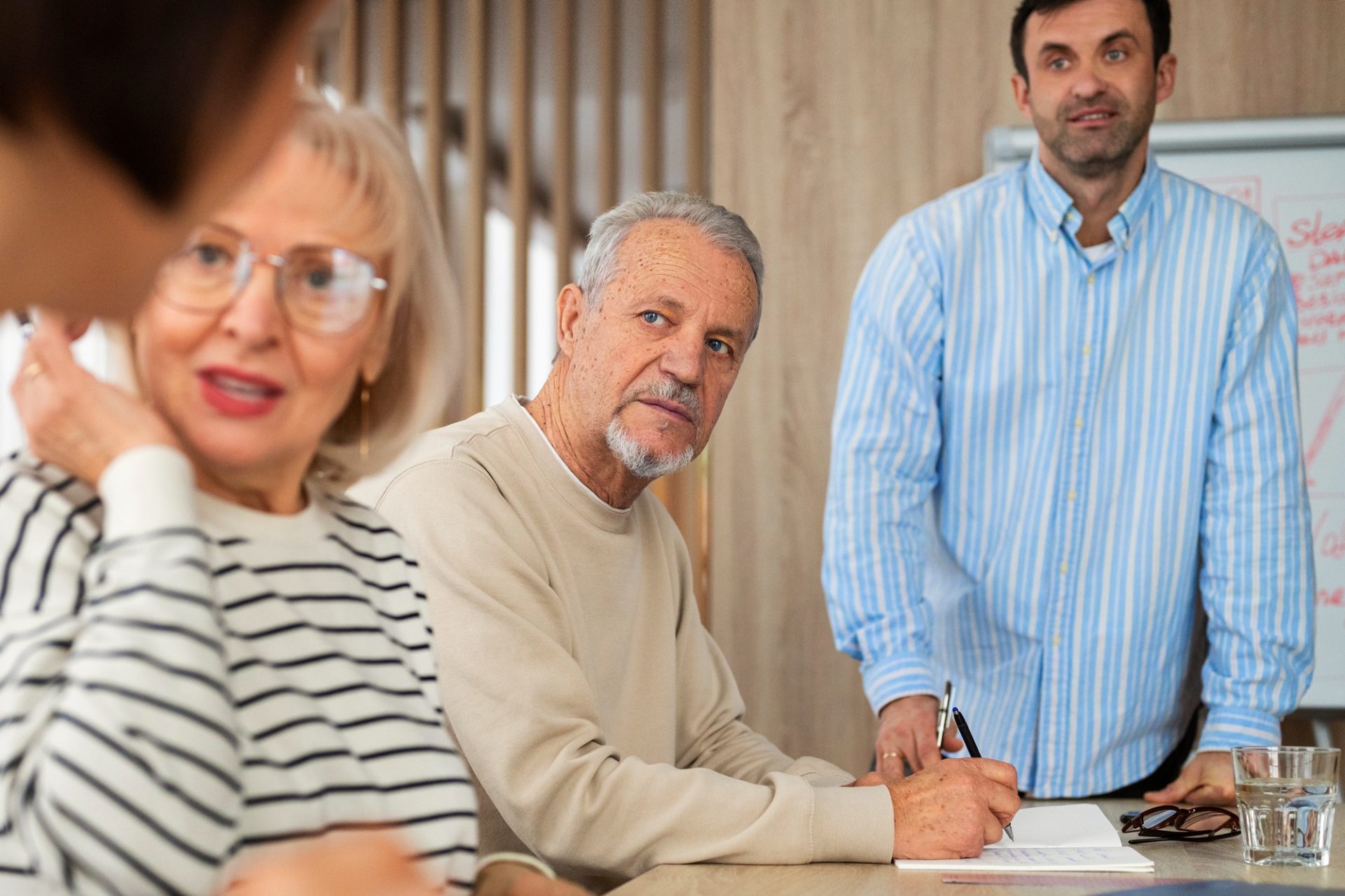 Family discussing retirement tax planning decisions with a financial advisor in Southwest Florida.