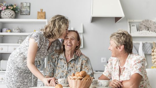 Family discussing health care retirement planning with a financial advisor in Southwest Florida.