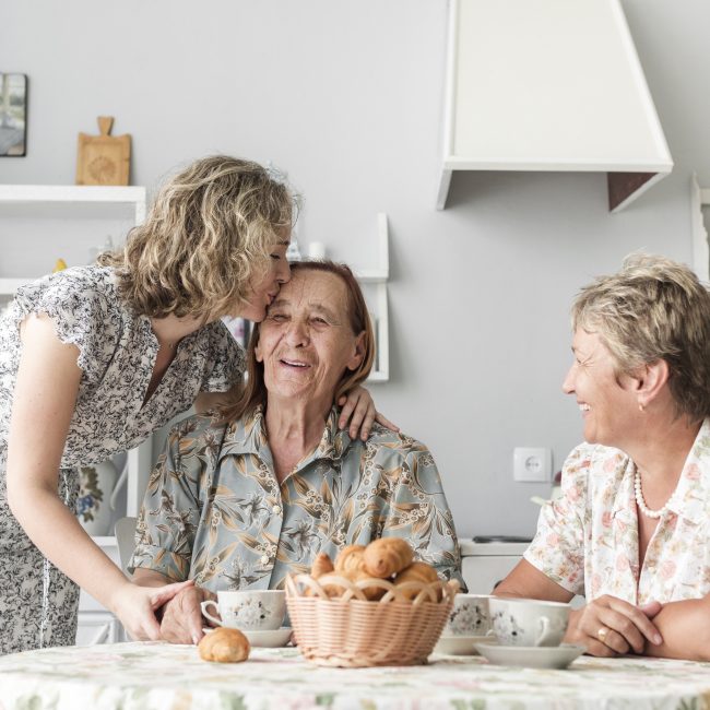 Family discussing health care retirement planning with a financial advisor in Southwest Florida.