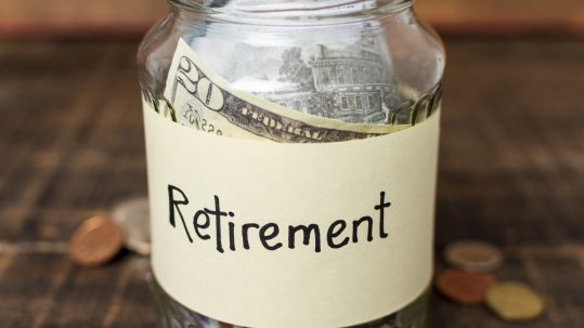 Financial advisor creating a personalized retirement income plan with clients in Southwest Florida.