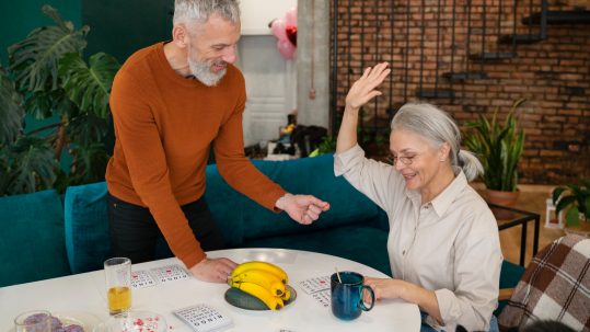 Financial advisor reviewing retirement tax planning strategies with clients in Southwest Florida.