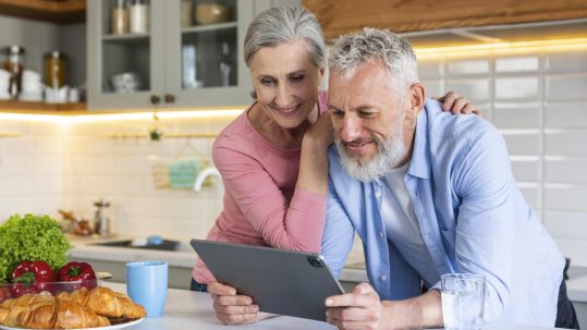 Financial advisor discussing financial planning strategies with clients in Southwest Florida during changing economic conditions.