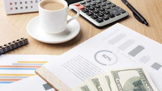 Financial advisor creating a personalized financial planning strategy with clients in Southwest Florida.