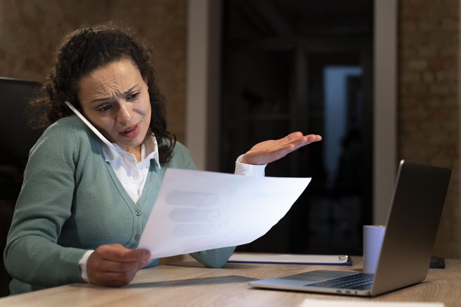 Federal employee reviewing retirement planning documents with a financial advisor in Southwest Florida.