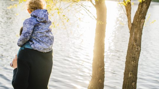 Family discussing legacy estate planning changes during a life transition with a financial advisor in Southwest Florida.