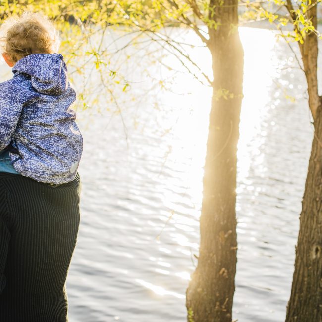 Family discussing legacy estate planning changes during a life transition with a financial advisor in Southwest Florida.