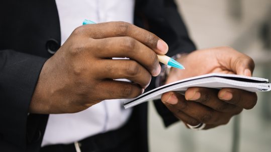 Financial advisor explaining legacy estate planning basics to a family in Southwest Florida.