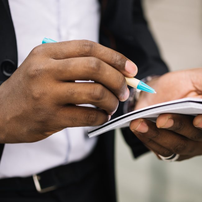 Financial advisor explaining legacy estate planning basics to a family in Southwest Florida.