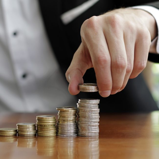 Financial advisor explaining bond ladder investment strategy to a client in Southwest Florida