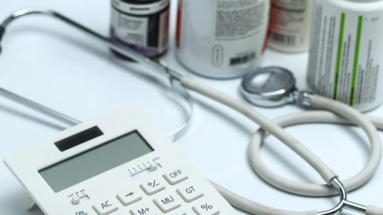 Financial advisor explaining HSA rules after age 65 to a client in Southwest Florida