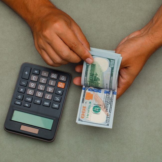 Financial advisor explaining how money market accounts are taxed to a client in Southwest Florida