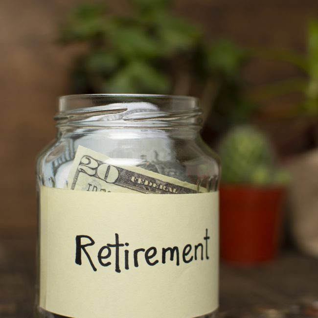 Financial advisor explaining 401k contribution strategy to a client in Southwest Florida