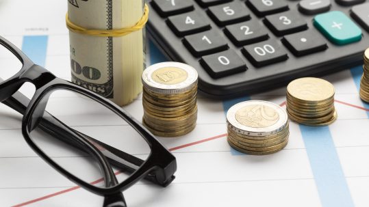 Financial advisor discussing retirement income planning questions with clients in Southwest Florida.