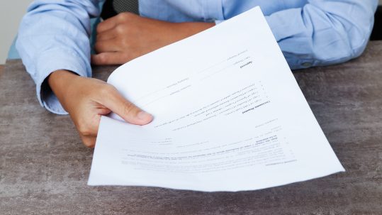 Financial advisor explaining revocable vs irrevocable trust differences to a client in Southwest Florida