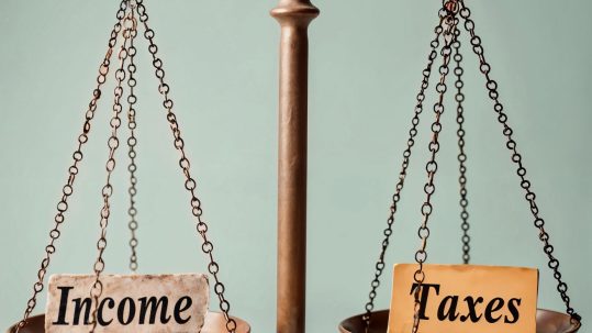 Financial advisor explaining Roth conversion tax strategy to a client in Southwest Florida