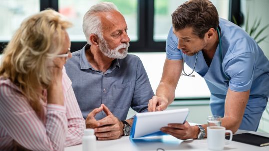 Financial advisor discussing long-term care planning options with a client in Southwest Florida