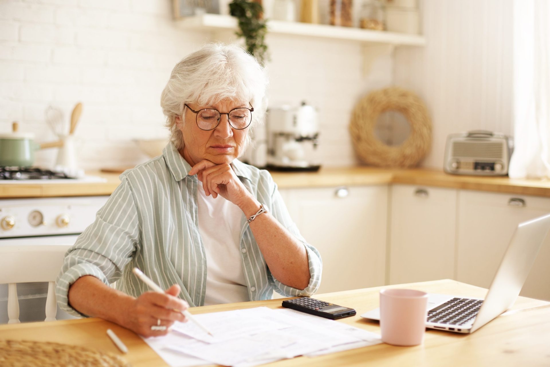 Financial advisor discussing retirement tax planning with a retired couple in Southwest Florida