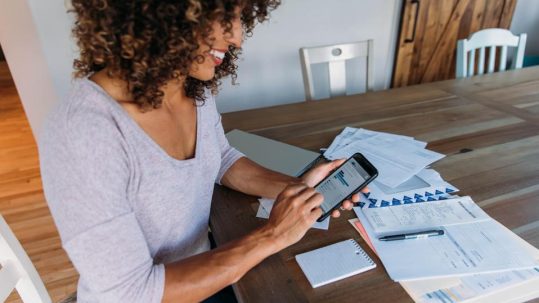 Person reviewing financial plan and asking if they are financially okay