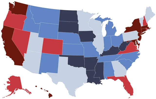 Retired couple reviewing retirement savings goals and state-by-state retirement costs with a financial advisor