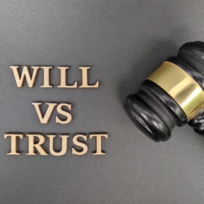 Family meeting with advisor and attorney discussing trust planning and estate planning goals