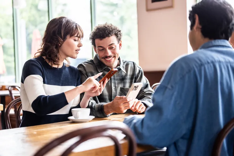 Couple meeting with a financial advisor to review retirement savings and long-term financial goals.