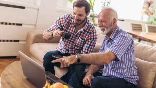 Estate planning documents with retirement account paperwork illustrating the importance of beneficiary designations.