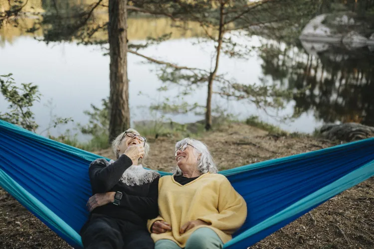 Couple meeting with a financial advisor to discuss retirement savings, retirement income, and long-term financial planning.