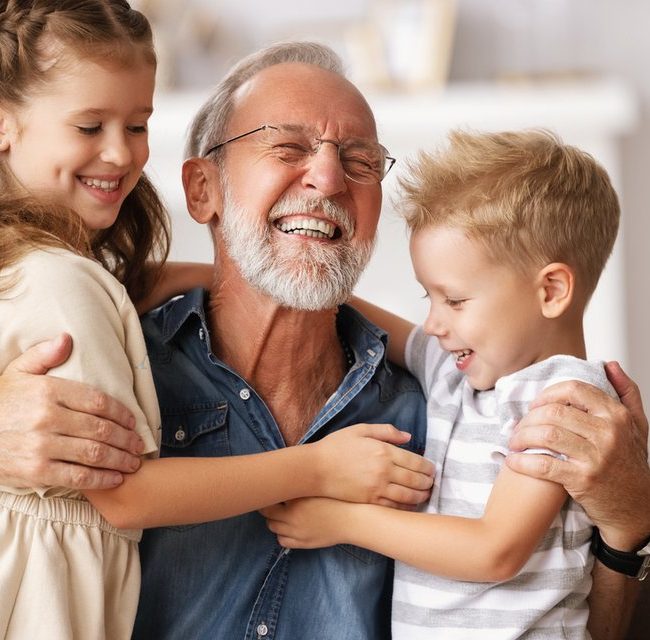 Grandparents comparing Trump Accounts and 529 College Savings Plans to help fund a grandchild's future education.