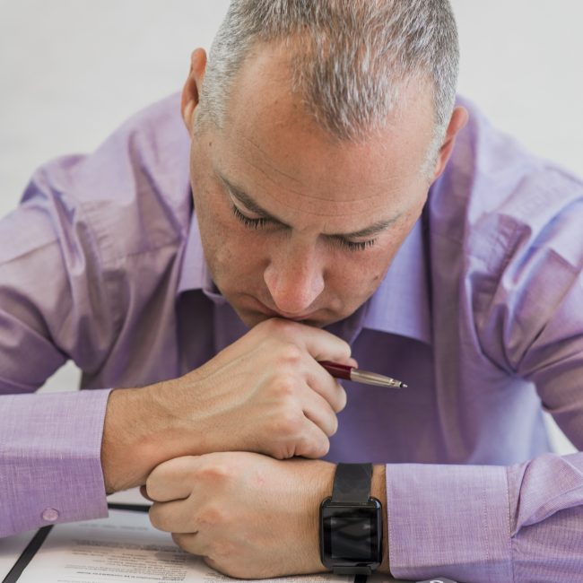 Financial advisor discussing Roth IRA conversion strategies, retirement tax planning, and investment accounts with a client.