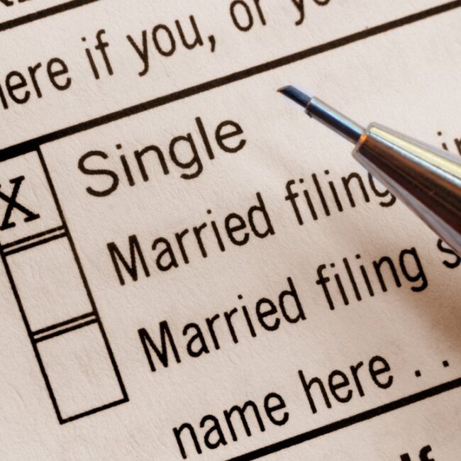 Single and married households reviewing finances and comparing net worth