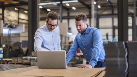 Business owner reviewing factors that may affect business valuation and a future sale